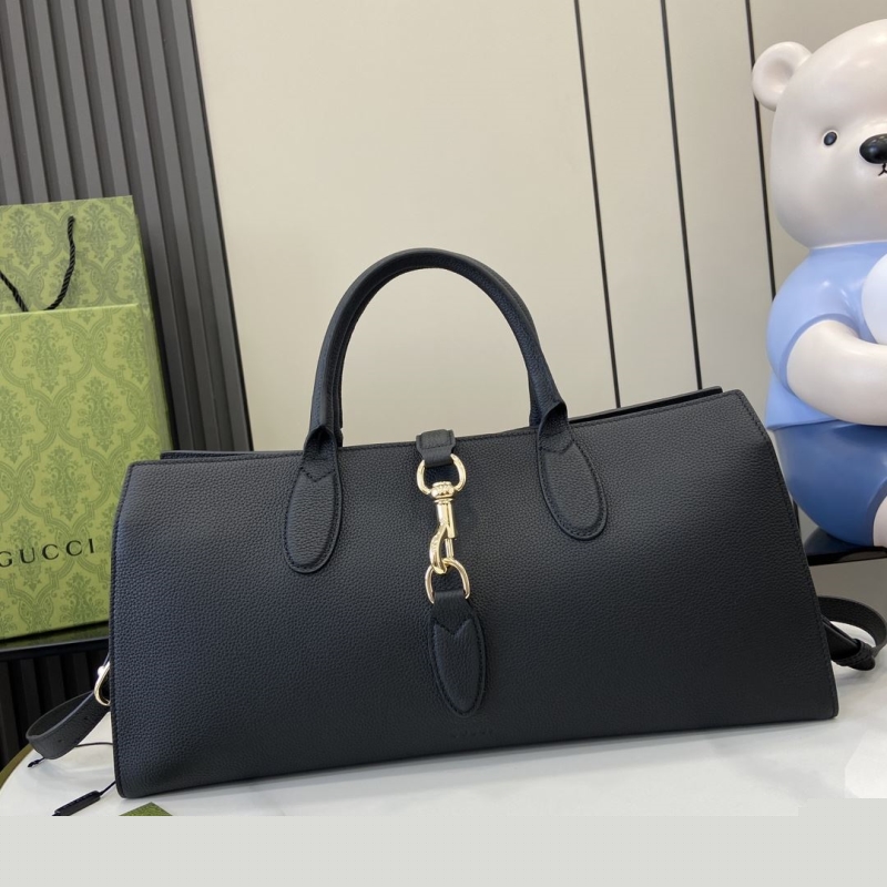 G*u*i top handle bags
